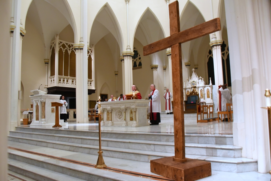 The sanctuary with the wooden cross in the foreground.