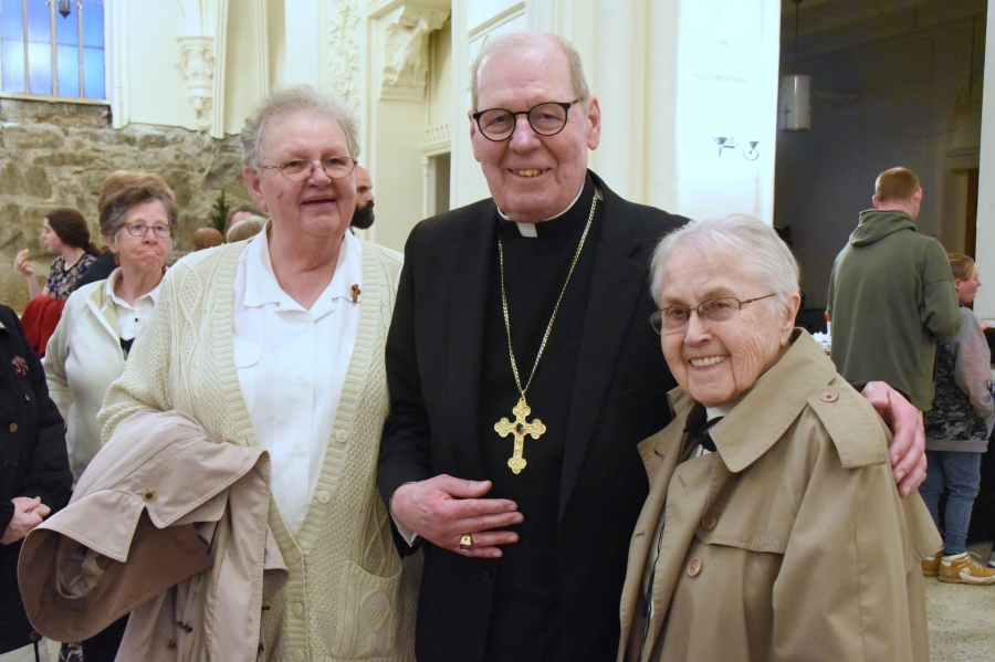 Bishop Robert Deeley, Sister Carol Martin, PFM, and Sister Juania