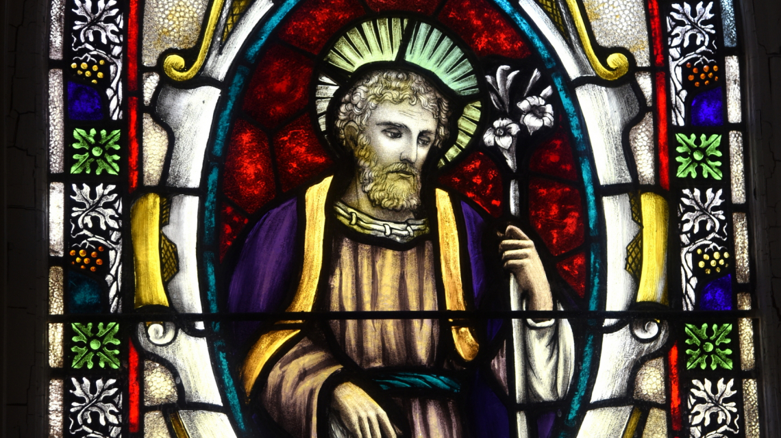 Stained glass image of St. Joseph