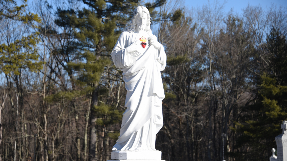 Sacred Heart of Jesus statue at St. Ignatius Cemetery