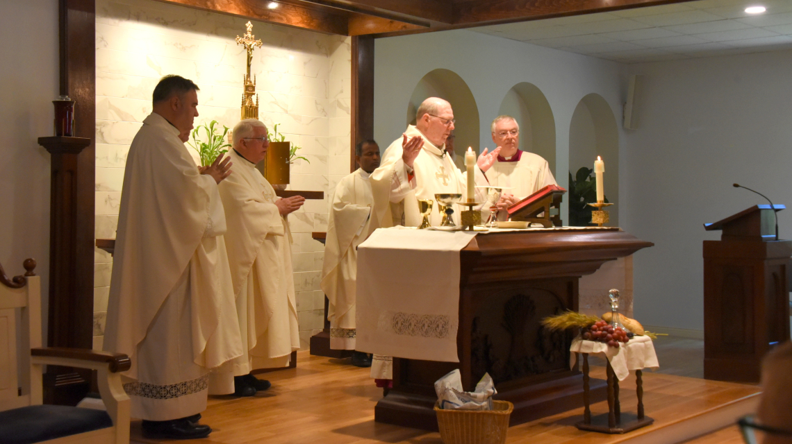 Bishop Robert Deeley celebrates the Eucharist