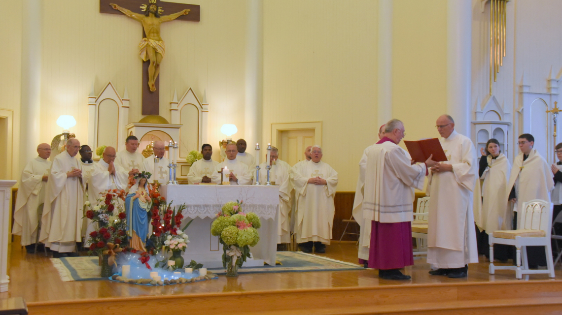 Sanctuary with the bishop and priests