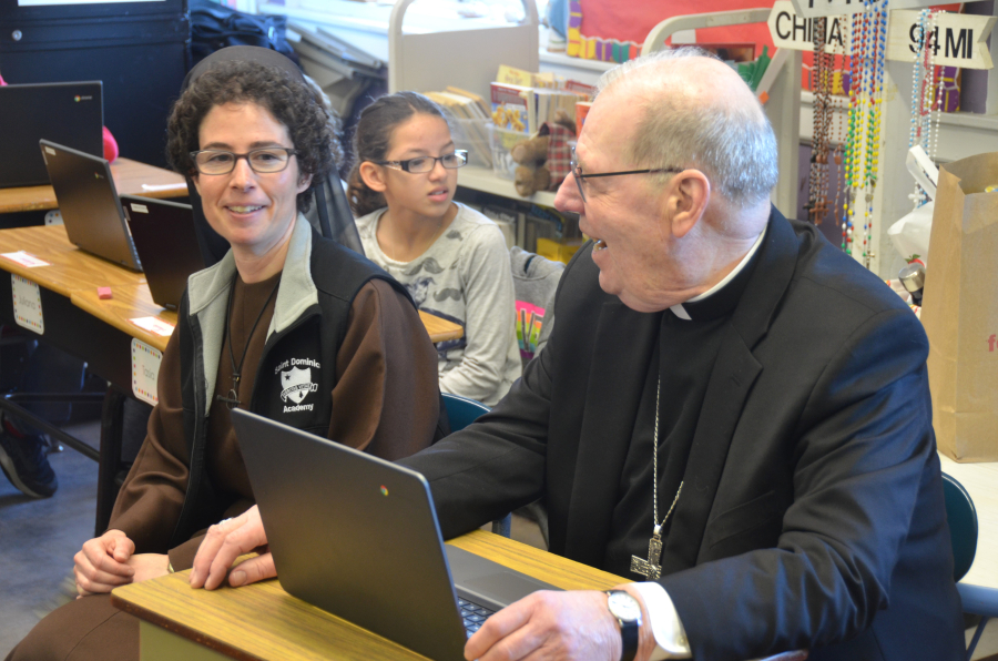 Bishop Deeley visits St. Dom's Lewiston campus during Maine Catholic Schools Week. 