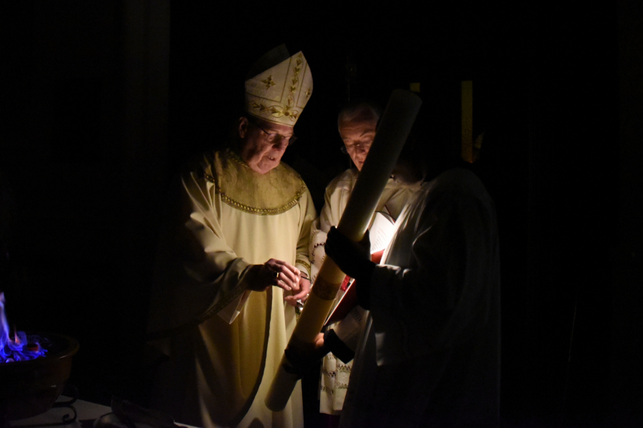 Preparing the paschal candle