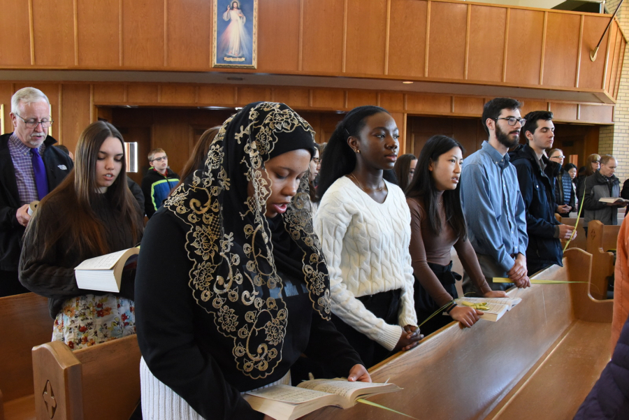 Colby College students attend Mass