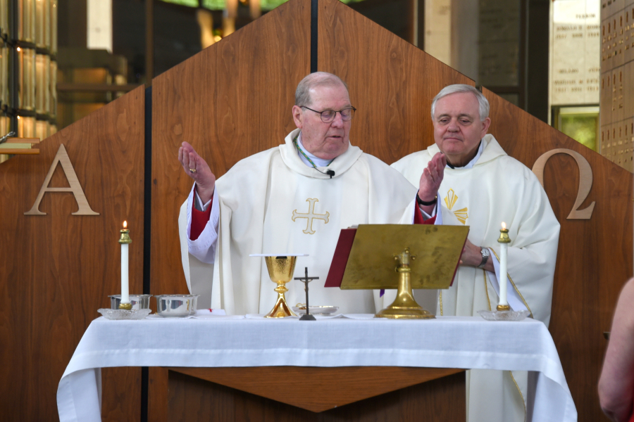 Bishop Robert Deeley and Father Robert Vaillancourt during the Liturgy of the Eucharist