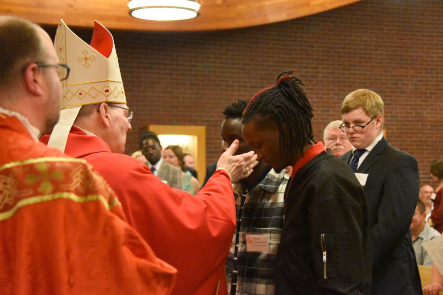 Receiving the sacrament of confirmation