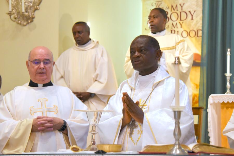 Bishop George Nkuo celebrates the Liturgy of the Eucharist.