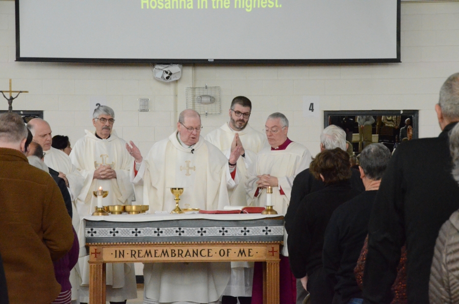 The bishops and priests at the altar