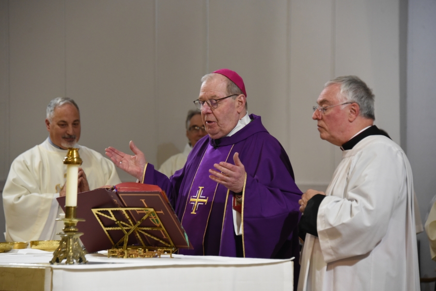 BIshop Deeley celebrates the Liturgy of the Eucharist.