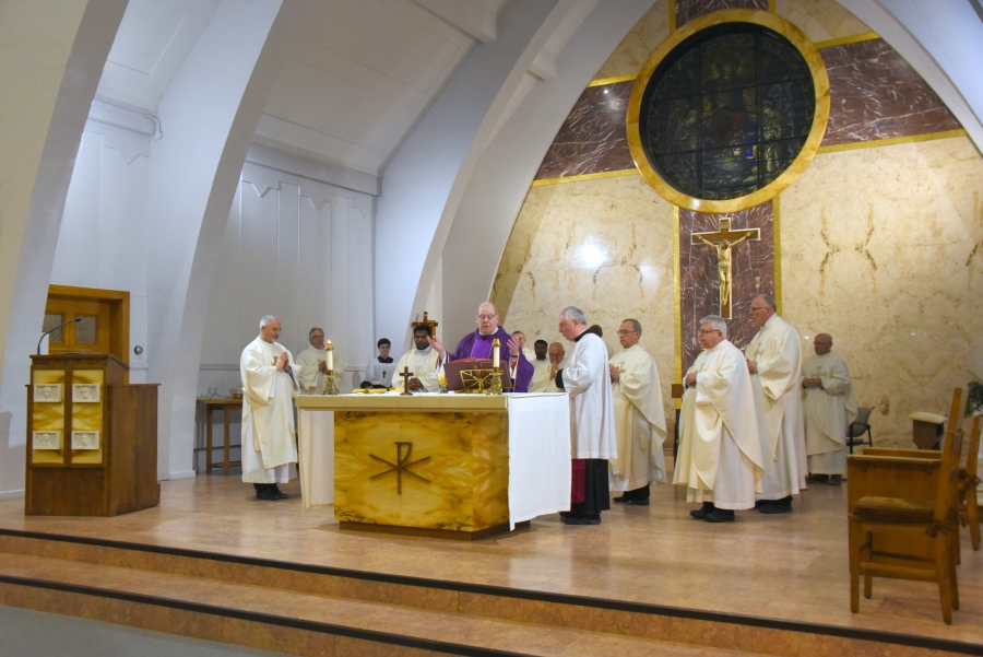 Bishop Deeley and priests celebrate the Liturgy of the Eucharist.
