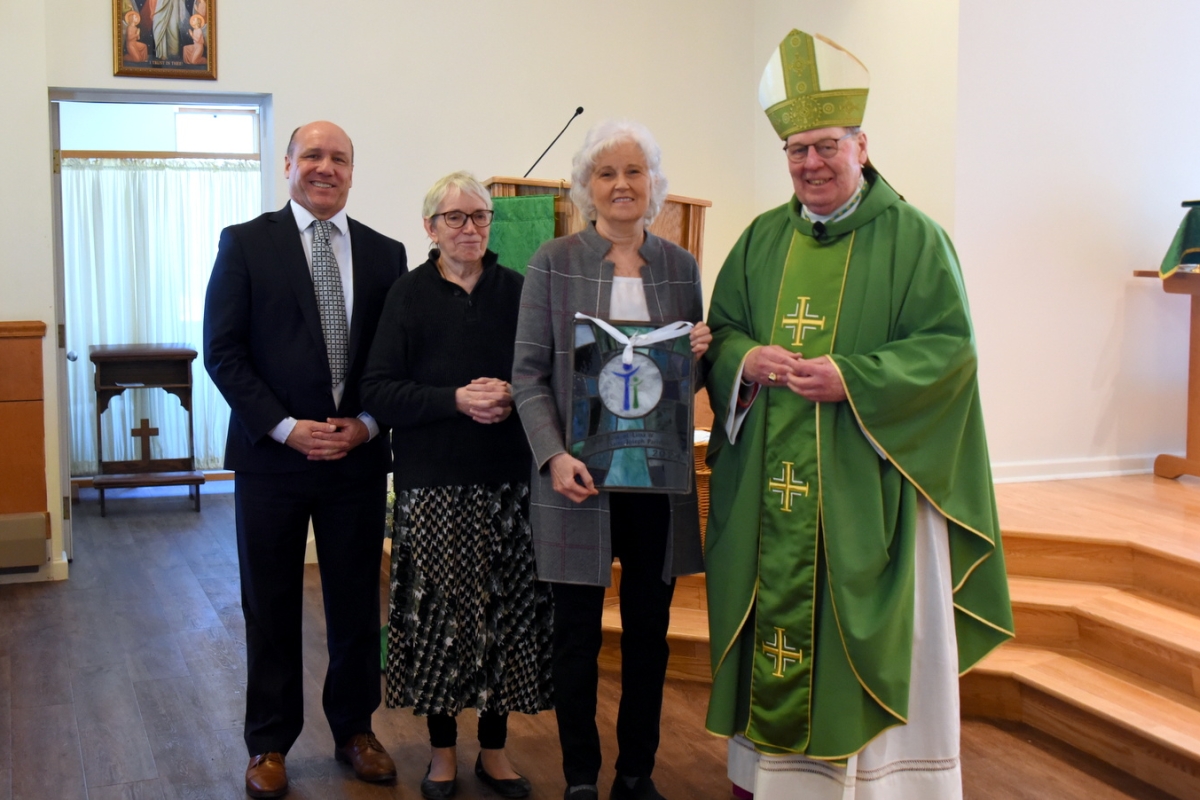 Stephen Letourneau, Annamaria Beal, Yvonne DeMillo, and Bishop Robert Deeley